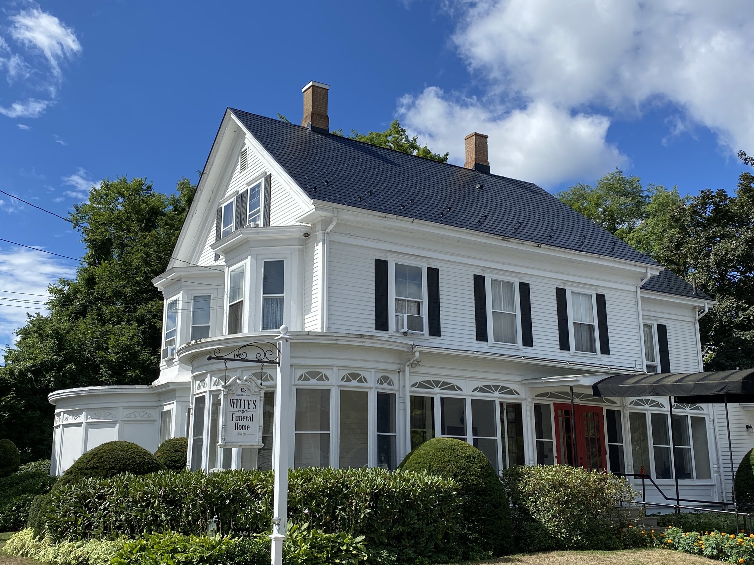 Metal shingles on roof of home