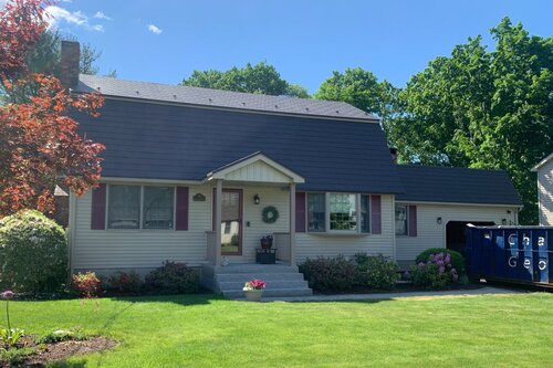 Metal shingles on roof of home
